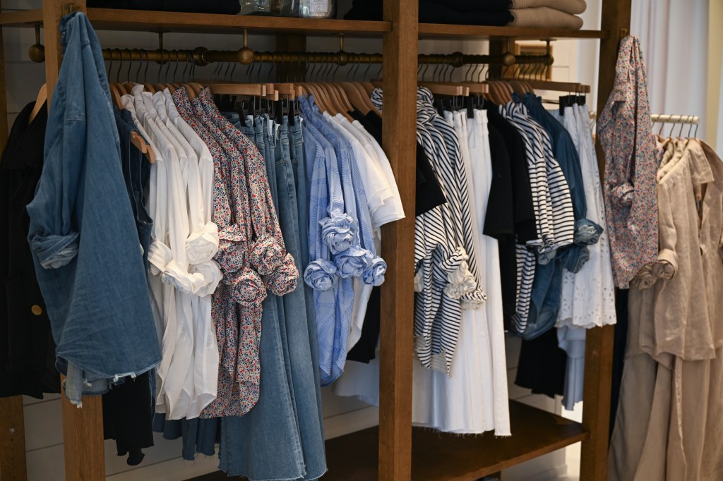 linen shirts hanging in the store